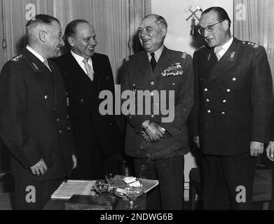 Marshal Alphonse Juin of France, Commander of NATO forces in Central Europe, talks with German Generals Adolf Heusinger, left, and Hans Speidel, right, during a visit to Bonn on Jan. 27, 1956. Second from left is West German Defence Minister, Theodor Blank. (AP Photo)