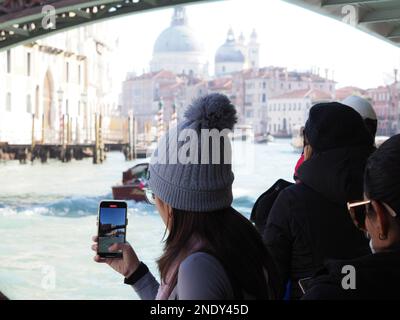 Venice, Italy - 13th february 2023 Carnival time and masked people gather in costume in Piazza San Marco area, Venezia. Stock Photo