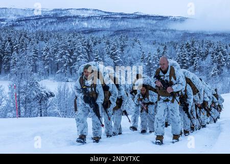 Setermoen, Finnmark, Norway. 29th Jan, 2023. U.S. Marines with Combat Logistics Battalion 2, Combat Logistics Regiment 2, 2nd Marine Logistics Group, conduct a 5-kilometer hike during Marine Rotational Force- Europe 23.1 in Setermoen, Norway, Jan. 29, 2023. MRF-E 23.1 focuses on regional engagements throughout Europe by conducting various exercises, mountain-warfare training, and military-to-military engagements, which enhances the overall interoperability of the U.S. Marine Corps with allies and partners. (Credit Image: © Christian Garcia/U.S. Marines/ZUMA Press Wire Service) EDITORIAL US Stock Photo