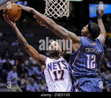 New Jersey Nets' Chris Douglas-Roberts dunks the ball during the