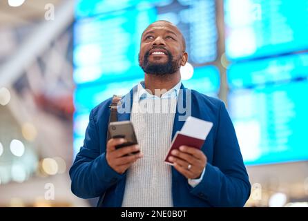 Airport, passport and black man with phone for ticket booking, schedule and flight information of business travel. Happy person thinking of airline Stock Photo