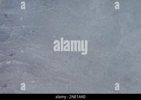 Samples of gray stone with a wavy pattern for the interior. Texture of ...