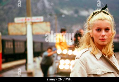 CATHERINE DENEUVE in THE UMBRELLAS OF CHERBOURG (1964) -Original title: LES PARAPLUIES DE CHERBOURG-, directed by JACQUES DEMY. Credit: PARC FILMS / Album Stock Photo