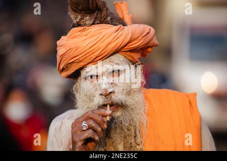 Kathmandu, Nepal. 16th Feb, 2023. A Hindu holy man or Naga sadhu, applies ash on his body at the premises of the Pashupatinath Temple ahead of the Shivaratri festival in Kathmandu. Hindu Devotees from Nepal and India come to this temple to take part in the Shivaratri festival which is one of the biggest Hindu festivals dedicated to Lord Shiva and celebrated by devotees all over the world. (Photo by Prabin Ranabhat/SOPA Images/Sipa USA) Credit: Sipa USA/Alamy Live News Stock Photo