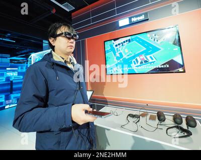 BEIJING, CHINA - FEBRUARY 16, 2023 - Visitors experience 'AR Movie' at the Metauniverse Technology Concept Exhibition at Zhongguancun Science Fiction Stock Photo
