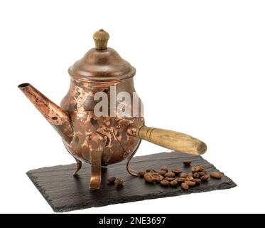 old copper coffee pot isolate on white background. Stock Photo