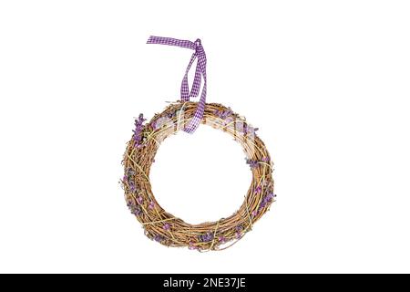 Attributes for Valentine's Day.Wicker wreath with lavender flowers.Isolate on a white background. Stock Photo