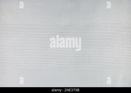 finely textured background of gray linen fabric. Stock Photo