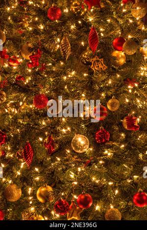 Shiny ornaments on Christmas tree Stock Photo