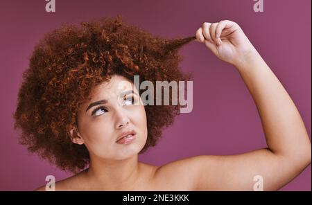 Face stress, hair loss or afro on beauty studio background in grooming, texture anxiety or fail. Woman, hand or natural hairstyle with damage, split Stock Photo