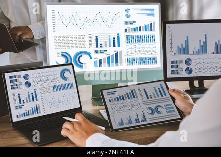 businessman works  Statistics Data Dashboard Information Business Technology and Strategy Research Stock Photo