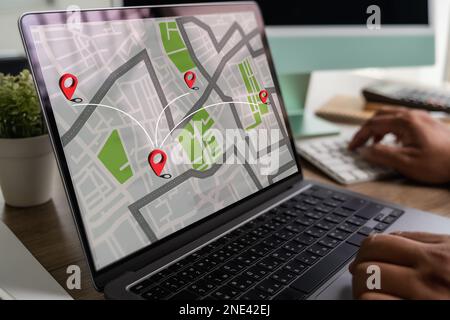 GPS route destination Maps require the use of GPS online mapping in the car, which controls the navigator for GPS tracking. Stock Photo