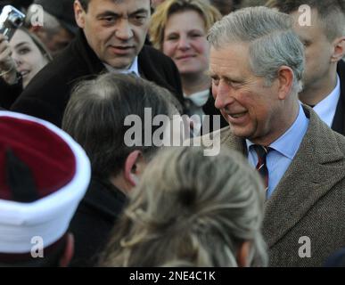 Britain's Prince Charles, the Prince of Wales, meets singer Annie