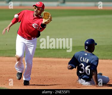 Milwaukee Brewers' Lorenzo Cain and Orlando Arcia smile during the