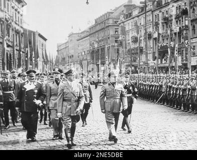 HITLER and Mussolini inspect a guard of honor in Munich, Germany 1937 ...