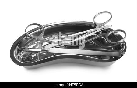 Surgical instruments in kidney dish on white background Stock Photo