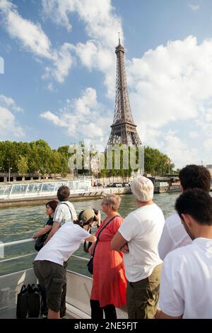 France, Paris, sightseers on a boat trip along the river Seine. Stock Photo