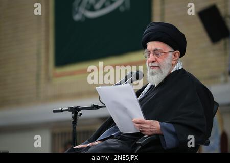 Tehran, Tehran, Iran. 15th Feb, 2023. A handout picture provided by the office of Iran's Supreme Leader Ayatollah ALI KHAMENEI on February 15, 2023, shows him in the capital Tehran addressing a gathering of people from the northwestern region of Iranian Azerbaijan. In this meeting, he greatly admired the Iranian nation for its 'historic'' turnout in this year's mass rallies to celebrate the 44th anniversary of the Islamic Revolution. 'This real, passionate, and meaningful epic is the result of the nation's persistence and not getting deviated from the path of the Revolution,'' he Stock Photo