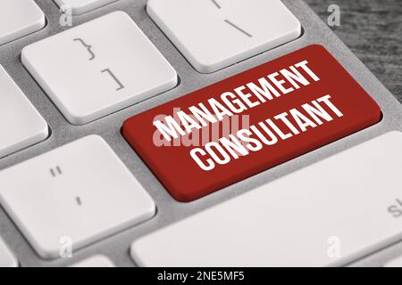 Button with text MANAGEMENT CONSULTANT on keyboard, closeup Stock Photo