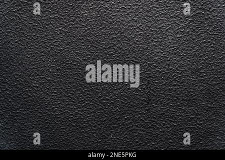 The texture of the black plastic ribbed surface for background Stock Photo