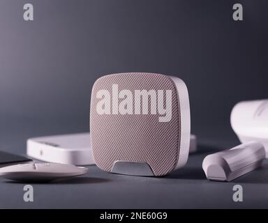 Smart House security system gadgets. Motion sensor, panic button, and alarm dinamic. Stock Photo