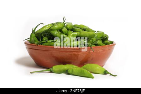 Bowl of Fresh Aji Limo Chili Peppers Isolated on White Stock Photo