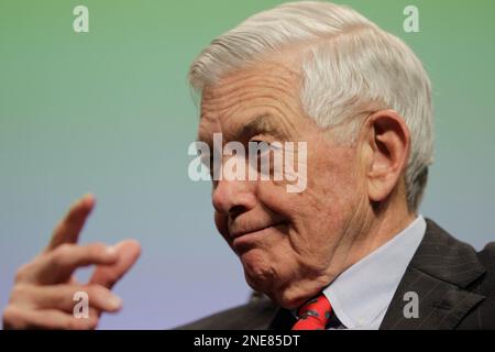 Former Bank of America CEO Hugh McColl, left, Carolina Panthers team owner Jerry  Richardson, center, and head coach John Fox chat during football practice  Thursday, May, 28, 2009, in Charlotte, N.C. (AP