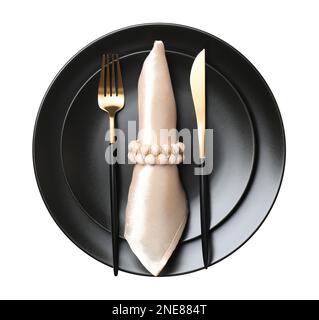 Plates with cutlery and napkin on white background, top view. Table setting Stock Photo