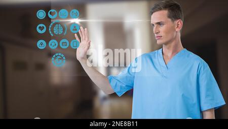 Composition of male surgeon touching screen with medical icons Stock Photo