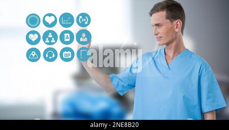 Composition of male surgeon touching screen with medical icons Stock Photo