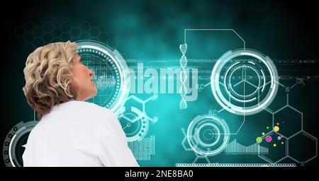 Composition on female doctor over screen with medical data processing Stock Photo