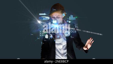 Composition of caucasian businesswoman touching screen with data processing Stock Photo