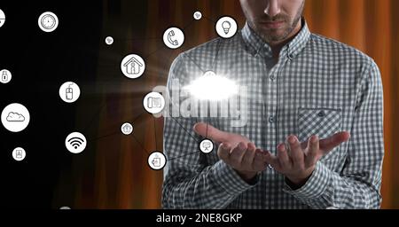 Composition of businessman touching screen with digital online icons. global technology, digital interface and communication concept digitally generat Stock Photo