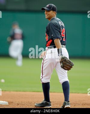 Atlanta Braves Infielder Martin Prado (#14) leaps for the catch