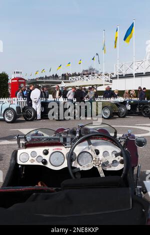 1920s and 1930s Frazer Nash sports-cars waiting in the Assembly Area,79th Members' Meeting, Goodwood motor racing circuit, Chichester, West Sussex, UK Stock Photo