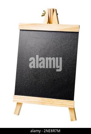 Small blackboard with a wooden frame on a stand isolated on white background. Saved clipping path. Stock Photo