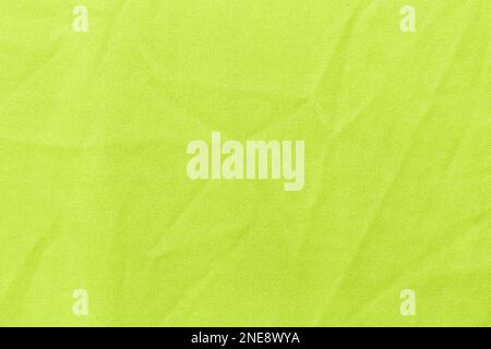 Light green Synthetic fabric texture, background. Light green fabric. Light green background. Stock Photo