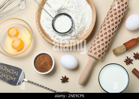 https://l450v.alamy.com/450v/2ne9cp6/cooking-utensils-and-ingredients-on-beige-background-flat-lay-2ne9cp6.jpg