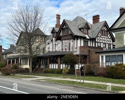 Large homes line the quiet residential streets in the Prospect Park South/ Ditmas Park neighborhood of Brooklyn, New York. Stock Photo