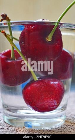 cherries submerged in water Stock Photo - Alamy