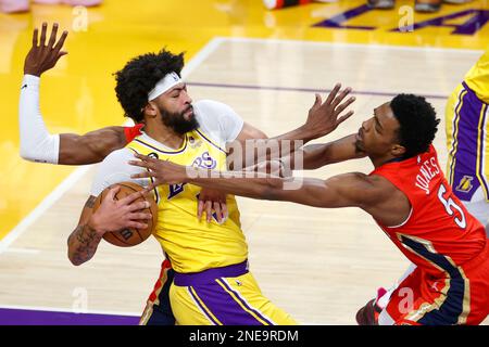Los Angeles Lakers forward Anthony Davis (L) and New Orleans Pelicans forward Herbert Jones (R) fight for the ball during an NBA basketball game in Los Angeles. (Photo by Ringo Chiu / SOPA Images/Sipa USA) Stock Photo