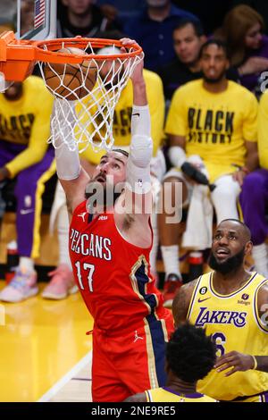 New Orleans Pelicans center Jonas Valanciunas is defended by Memphis ...