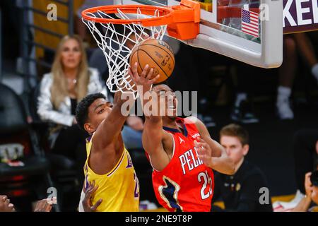 Los Angeles, United States. 15th Feb, 2023. New Orleans Pelicans forward Trey Murphy III (R) goes to basket under pressure from Los Angeles Lakers forward Rui Hachimura (L) during an NBA basketball game in Los Angeles. (Photo by Ringo Chiu/SOPA Images/Sipa USA) Credit: Sipa USA/Alamy Live News Stock Photo