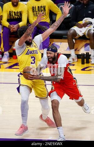New Orleans Pelicans forward Brandon Ingram (R) drives against Los Angeles Lakers forward Anthony Davis (L) during an NBA basketball game in Los Angeles. Stock Photo