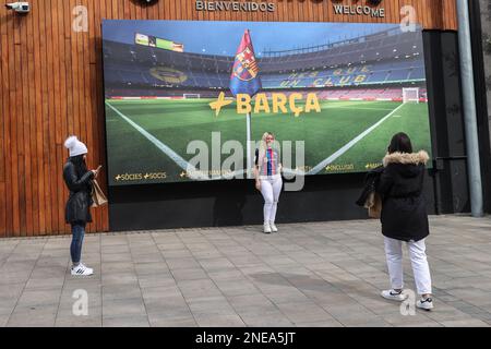 A Barcelona fan having a selfie in front of Spotify Camp Nou poster during the UEFA Europa League Knockout Round Play-Offs Barcelona vs Manchester United at Spotify Camp Nou, Barcelona, Spain, 16th February 2023  (Photo by Mark Cosgrove/News Images) in Barcelona, Spain on 2/16/2023. (Photo by Mark Cosgrove/News Images/Sipa USA) Stock Photo
