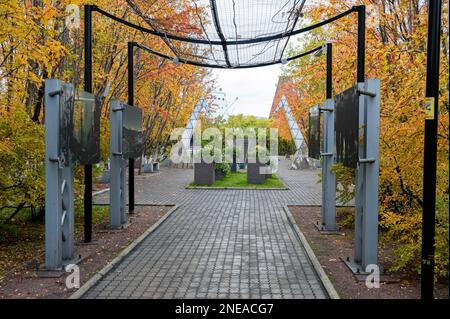 MURMANSK, RUSSIA - SEPTEMBER 17, 2021:Mirror memorial in the form of an inverted pyramid. Memorial murmansk hero city.Obelisk to the lost port workers Stock Photo