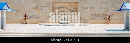 Athens, Greece - August 30, 2022: The changing of the guard at the Tomb of the Unknown Soldier in Athens, Greece, with the white and blue sentry boxes Stock Photo
