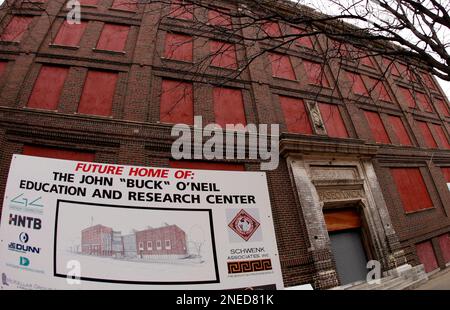 In this photo taken on Thursday, Jan. 28, 2010, a shuttered old YMCA building stands empty near the Negro Leagues Baseball Museum in Kansas City, Mo. Three and a half years after the death of museum founder and ambassador Buck O'Neil, the museum is finding itself on shaky financial ground with plans for the center on hold. (AP Photo/Charlie Riedel)