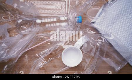 domestic plastic waste - heap of household plastic trash such as bottles bags containers and packaging material Stock Photo