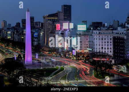 Traffic at the obelisk on Avenida 9 de Julio in the last daylight, blue hour, Buenos Aires, Argentina Stock Photo